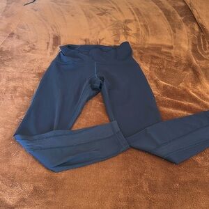Lululemon leggings.  Wonder under fabric.  Size 6